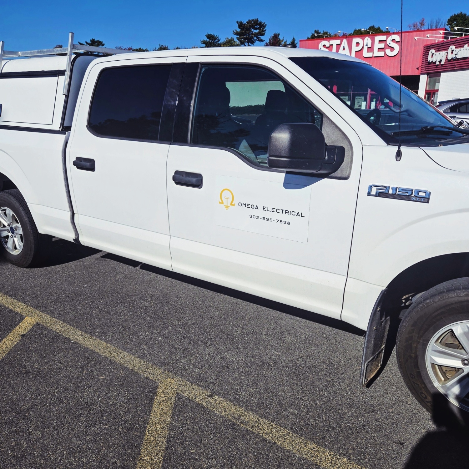Omega Electrical work truck on job site